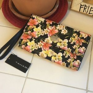 LAST CHANCE TO BUY BEFORE ITEM IS DONATED. Tahari. Floral Trifold Wristlet.